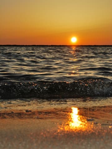 Golden-hour sun over the sea